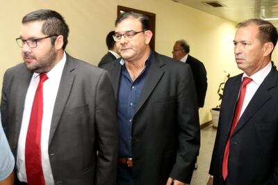 El diputado Tomás Rivas (centro) debe presentarse el lunes a  su preliminar.