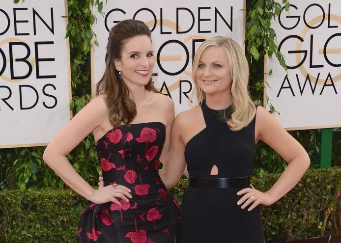 Las actrices Tina Fey y Amy Poehler volverán a estar  este año al frente de la ceremonia de premiación, pero desde ciudades distintas. Foto: AFP
