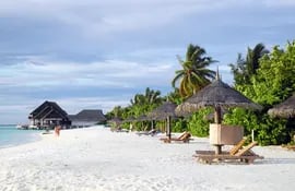 Playa, mar y palmeras, casi nada más: las islas Maldivas son un destino clásico de los mieleros.