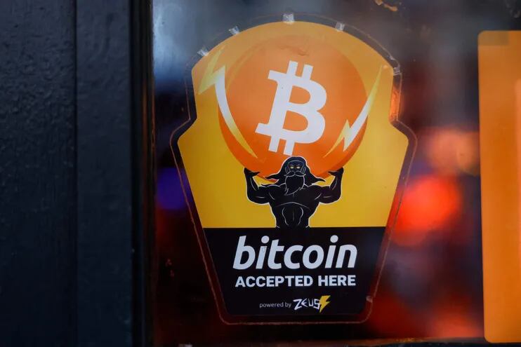 NEW YORK, NEW YORK - FEBRUARY 29: A Bitcoin Accepted Here sticker is seen at Pubkey Bar on February 29, 2024 in New York City. The price of bitcoin reached $63,000 on Wednesday for the first time since the peak of the last bull market in November 2021, which coincided with the U.S. traded spot ETFs.   Michael M. Santiago/Getty Images/AFP (Photo by Michael M. Santiago / GETTY IMAGES NORTH AMERICA / Getty Images via AFP)